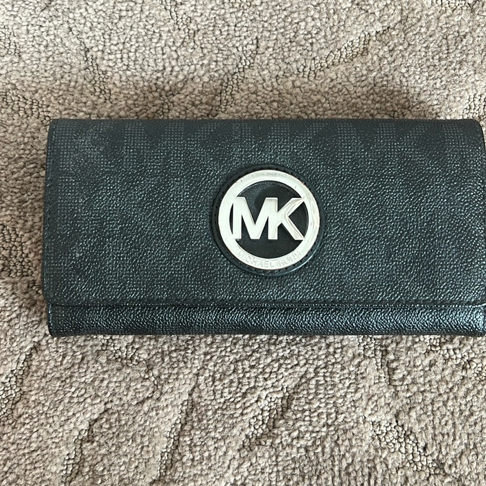 Ladies Michael Kors bifold wallet with MK logo